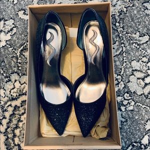 Sparkly black pointy heels